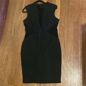 NWT Beautiful elegant black bodycon dress with lace on the sides